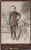 Dale Otis Edminster as young boy posing beside his crutches. Dale used to tell people he had 'TB of the legs'.